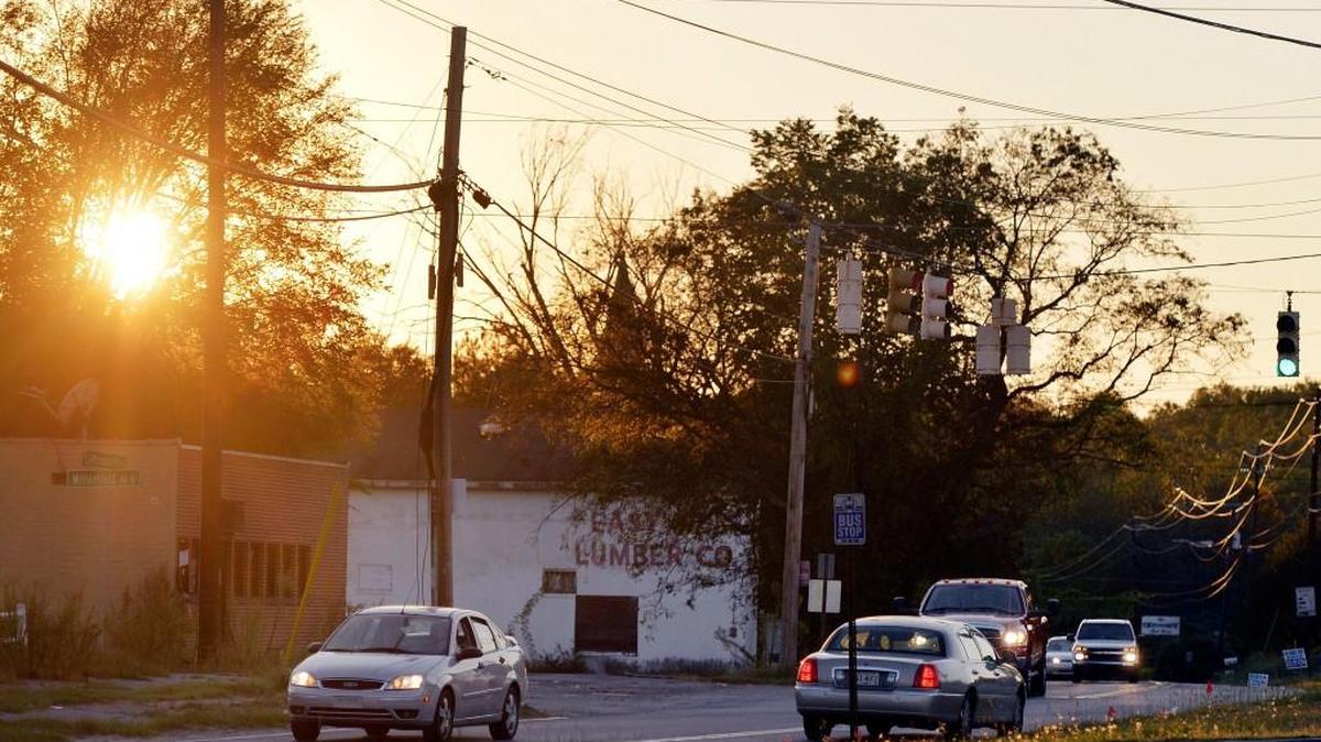Traffic rolls along Jeffersonville Road at the intersect with Millerfield Road Friday evening. Designs for the first phase of the widening of Jeffersonville Road from Emery Highway to Recreation Road are close to being completed.
