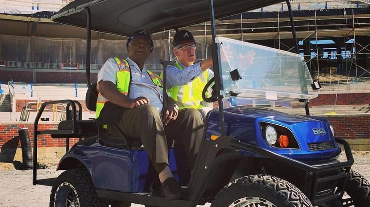 Braves legend Hank Aaron taking in SunTrust Park with Braves Chairman and CEO Terry McGuirk in September. Aaron to throw out the first pitch at Sun Trust Park on Friday night.
