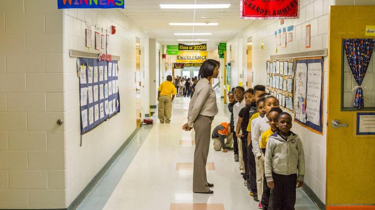 Students line up in the hallway at Burdell Elementary School.