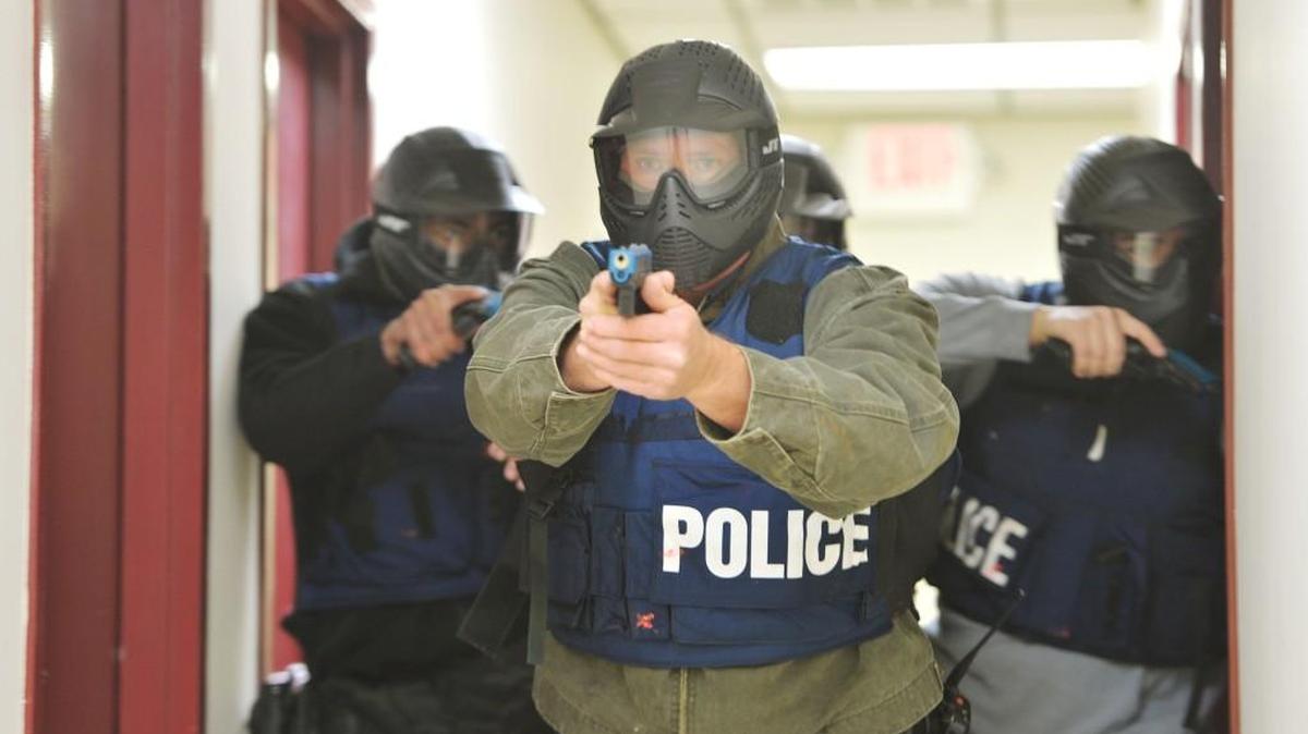 Bibb Sheriff's Office SWAT team members train for active shooter scenarios at their practice range a day after the mass shooting in San Bernardino, California.