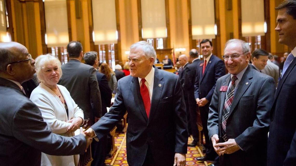 Georgia Gov. Nathan Deal shakes hands as he leaves the House floor after delivering the State of the State address in Atlanta on Jan. 11, 2017. Deal asked Georgia lawmakers to support a new plan for fixing low-performing schools after voters last fall rejected a proposal for state takeovers of schools that consistently struggle. The Republican governor said that nearly 89,000 students were stuck in failing schools last year and their number “will grow with each passing school year” if nothing is done.
