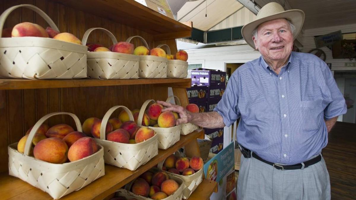 Robert L. Dickey at the peach packing plant.