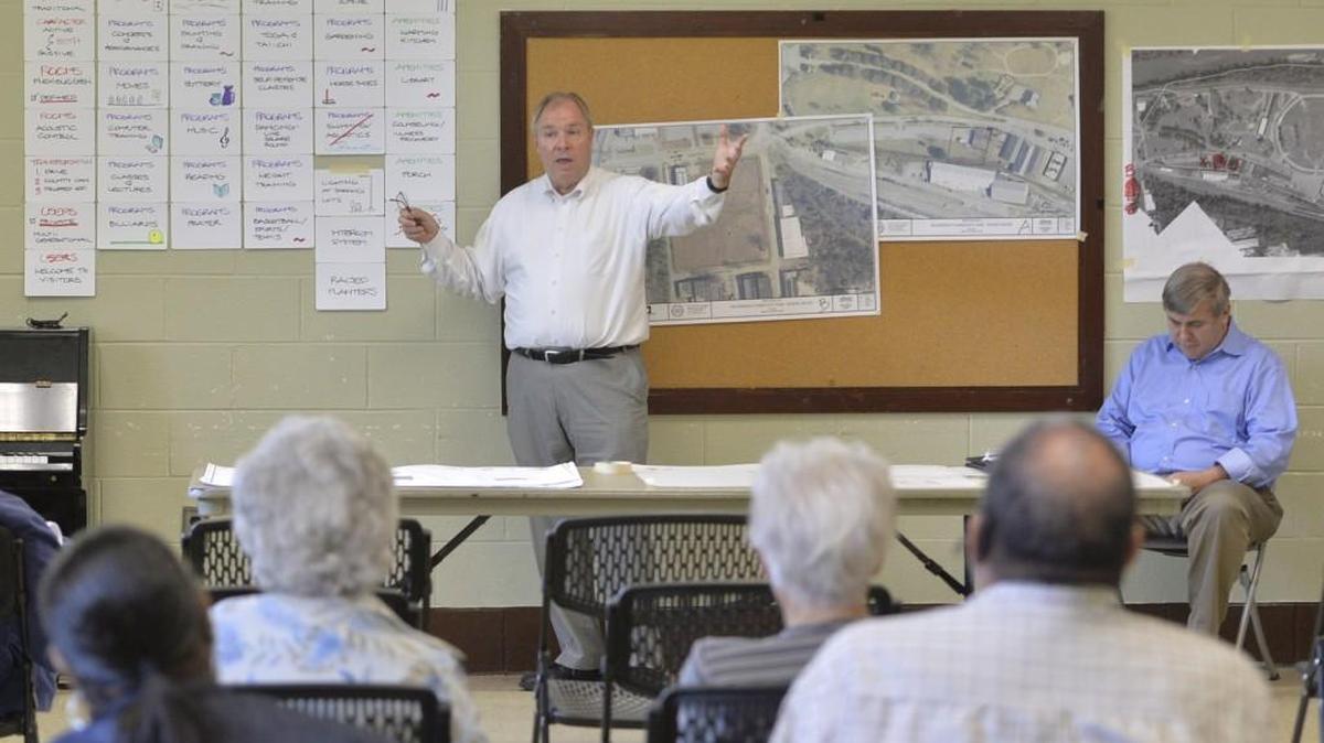 With a ``wish list'' of amenities Bibb seniors have said they want in a new center, architect Bruce Morris fields questions about the two sites officials have narrowed a search to at North Macon Park. About a dozen attended the Sept. 23, 2015, meeting where they overwhelmingly chose the site inside Central City Park as the favorite. ``This is democracy 101,'' Morris said after the vote.