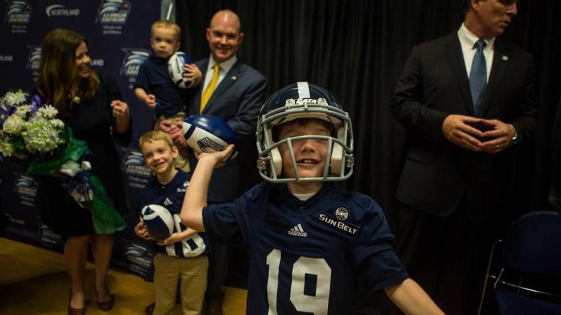 Tyson Summers, center, is seen when he was announced as Georgia Southern’s football head coach in December 2015. He is pictured with his wife, Beth, and sons Jake, wearing helmet, Walker and Anderson, in Tyson’s arms.