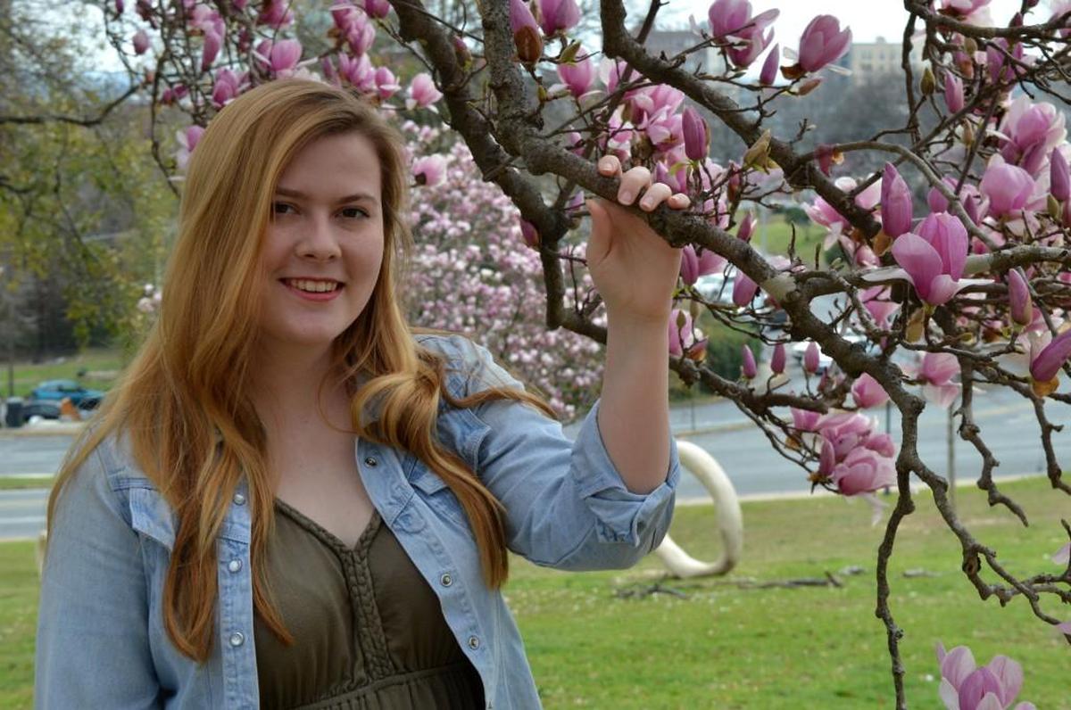 Elizabeth Tammi poses for a picture at Coleman Hill.