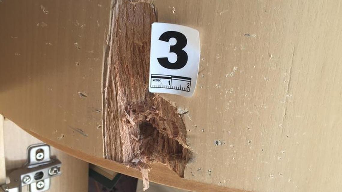 Someone fired “at least one round” through the front glass of Gottwals Books on Russell Parkway with two employees inside at closing Monday night. A bullet struck this counter.