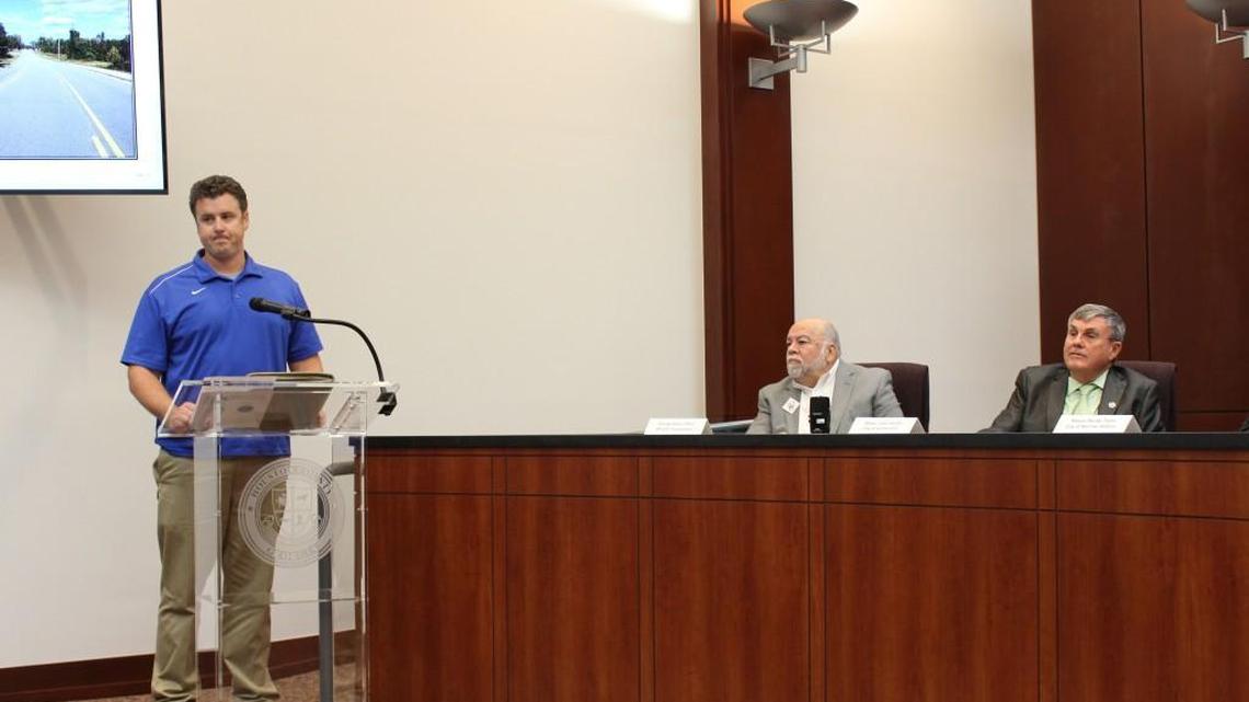 Wes Hamborg, coach of the Warner Robins Aquanauts swim team, at a public hearing Wednesday speaks in favor of an indoor swim facility included in a proposed sales tax referendum in Houston County.