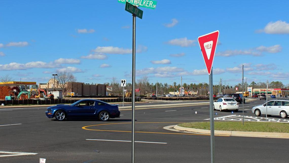 Traffic moves through the intersection of Cohen Walker Drive and Lake Joy Road last week, where a traffic signal is slated to be installed.