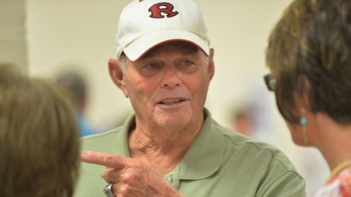 Richard Fendley visits with Warner Robins football alums and their wives in 2004.