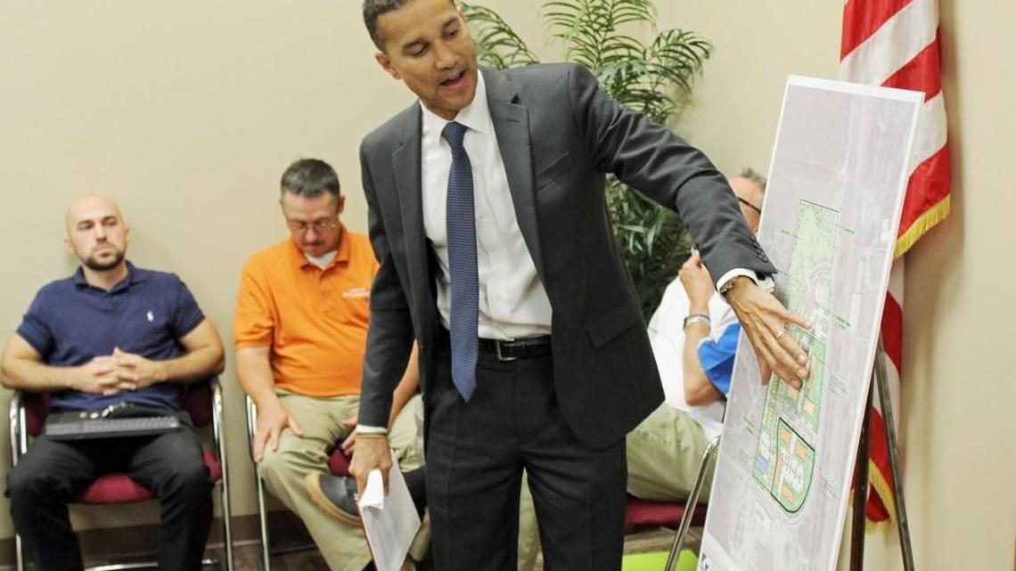 Amon Martin, senior developer for Pennrose, talks to Warner Robins City Council on Monday about the plan for construction of a 90-unit apartment complex on Armed Forces Boulevard across from the veterans training center.