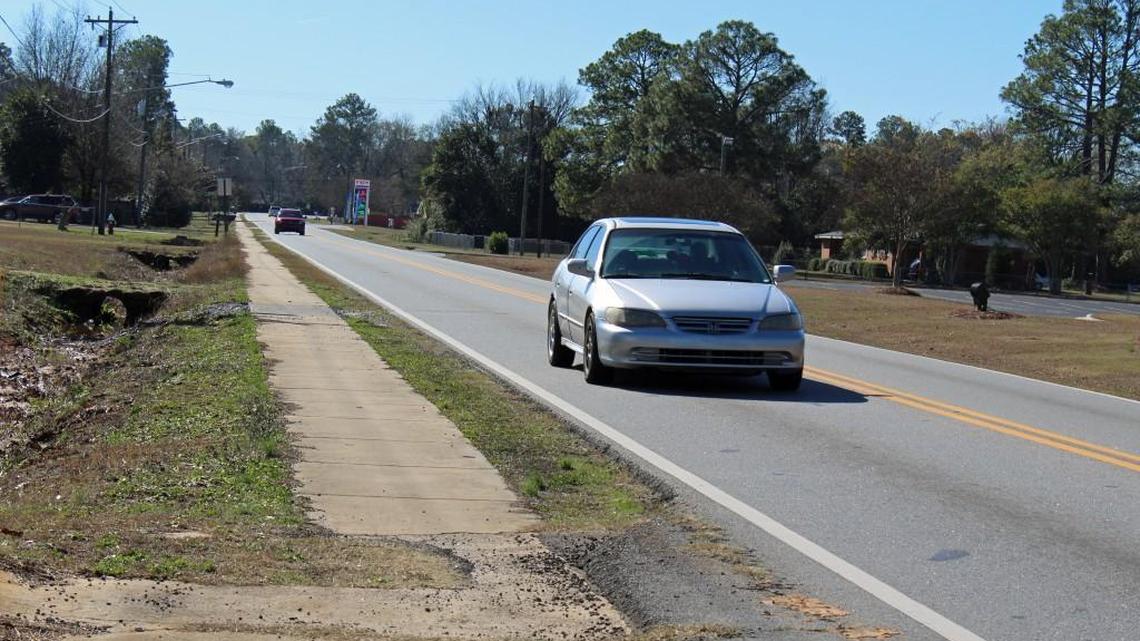 Cars move along Elberta Road on Tuesday near Northside Drive. The road is slated to widened with a center turn lane to be added.