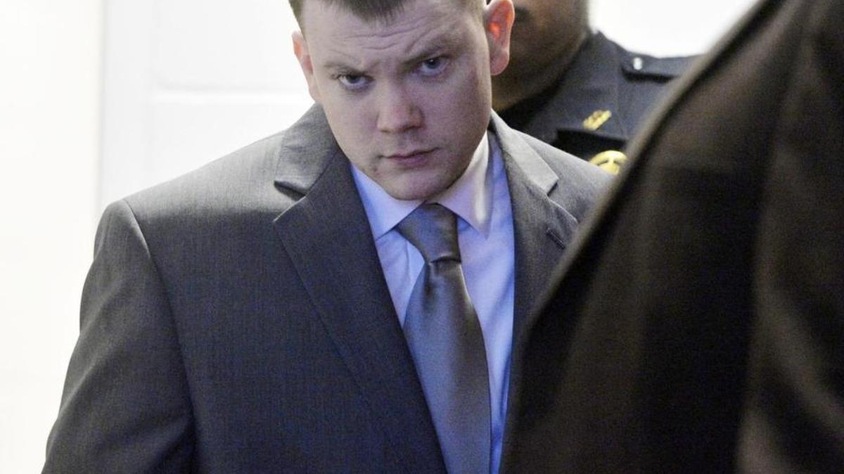 Cole Crouch makes his way into a Houston County courtroom Thursday where he testified in his own defense.