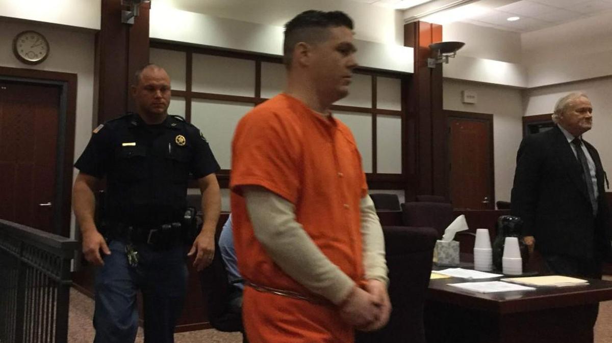 Robert Norman Barlow, 31, of Bonaire, who previously pleaded guilty to filming undressed girls through bathroom and bedroom windows, enters a Houston County courtroom for a sentencing hearing Thursday.