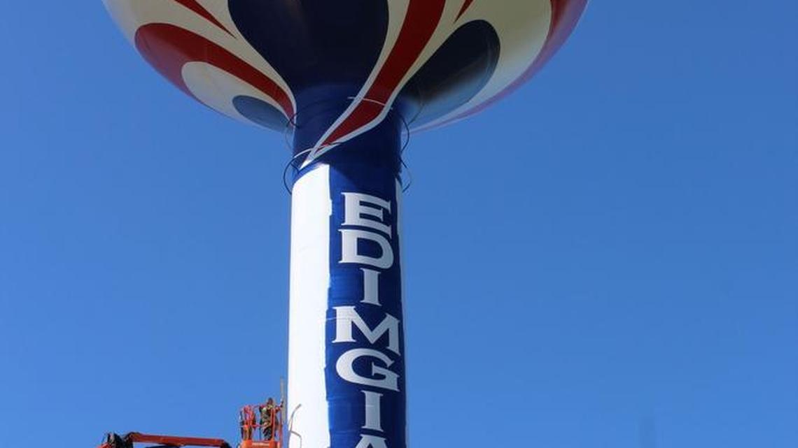 Jim Kelly paints a water tower in Houston County earlier this year. The tower is located on Ga. 96 near Houston County High School and has won a people’s choice vote by water tower enthusiasts.