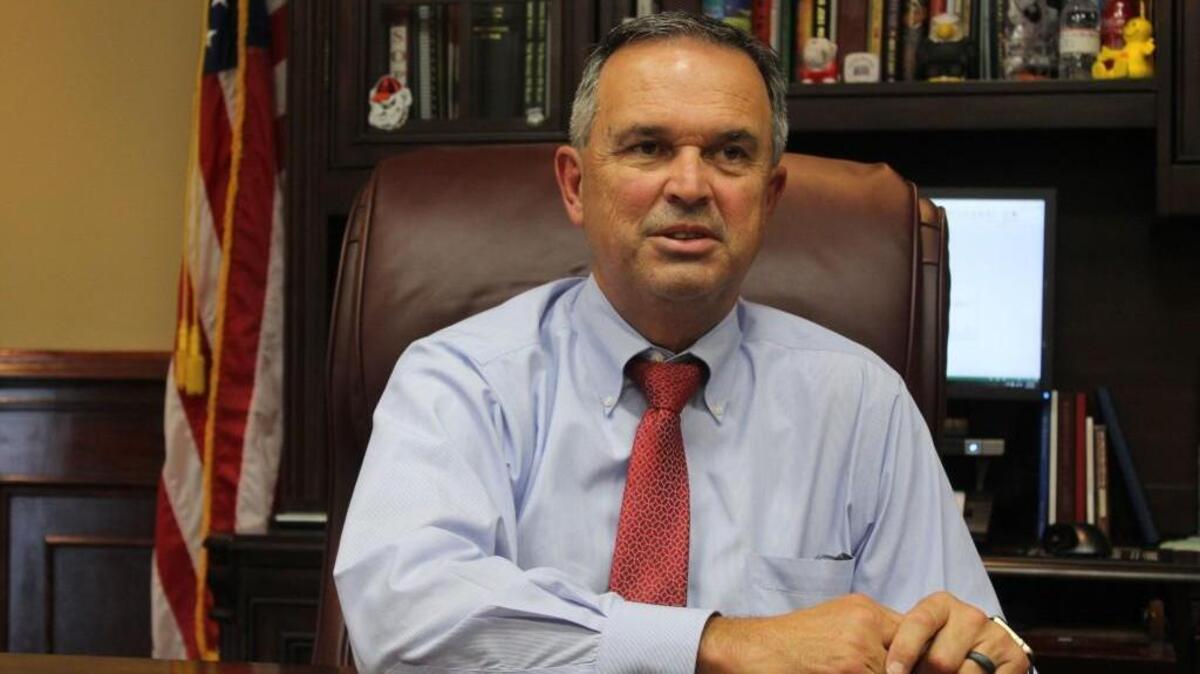 Warner Robins Mayor Randy Toms talks about why he should be re-elected during an interview in his office.