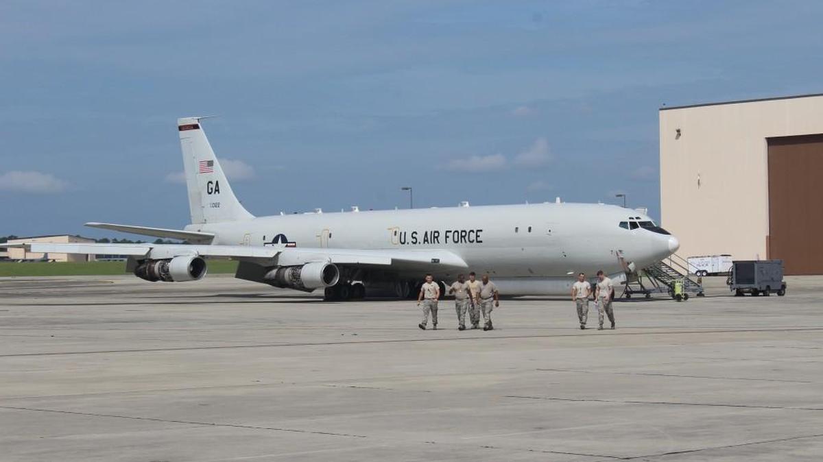 Aircraft maintenance workers in the 116 Air Control Wing walk in front of a J-STARS E-8C plane at Robins Air Force Base in this Telegraph file photo.