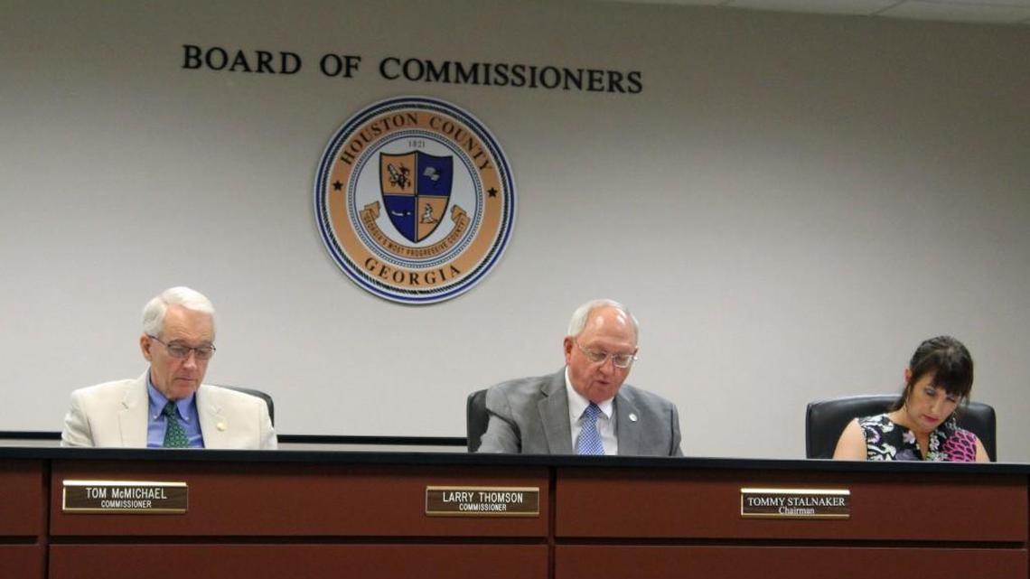 Houston County Commission Chairman Tommy Stalnaker, center, talks about the proposed budget at Tuesday's meeting as commissioners Larry Thomson and Gail Robinson listen.