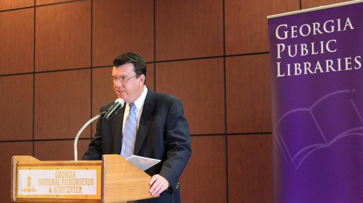 Stephen Shimp, director of the Georgia National Fairgrounds and Agricenter, announces a partnership Wednesday to give free fair tickets to winners of summer reading programs at public libraries throughout the state.