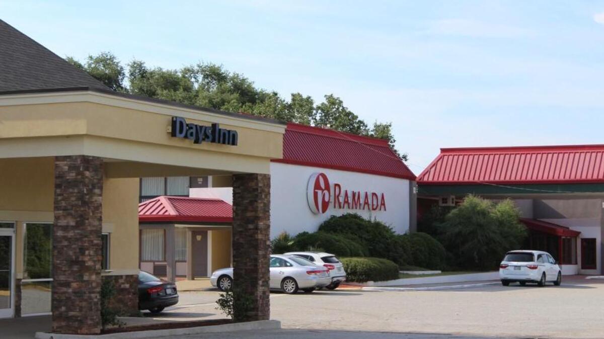 The Perry City Council on Tuesday held a public hearing Tuesday on whether to revoke the business license of the Days Inn and Ramada Inn for failure to pay the hotel motel tax.