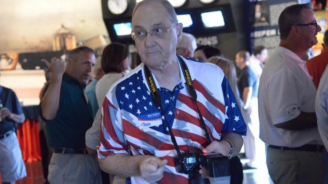 Bob Dubiel, longtime voice of the Museum of Aviation, is shown in this undated museum photo working at an event. Dubiel died Monday.