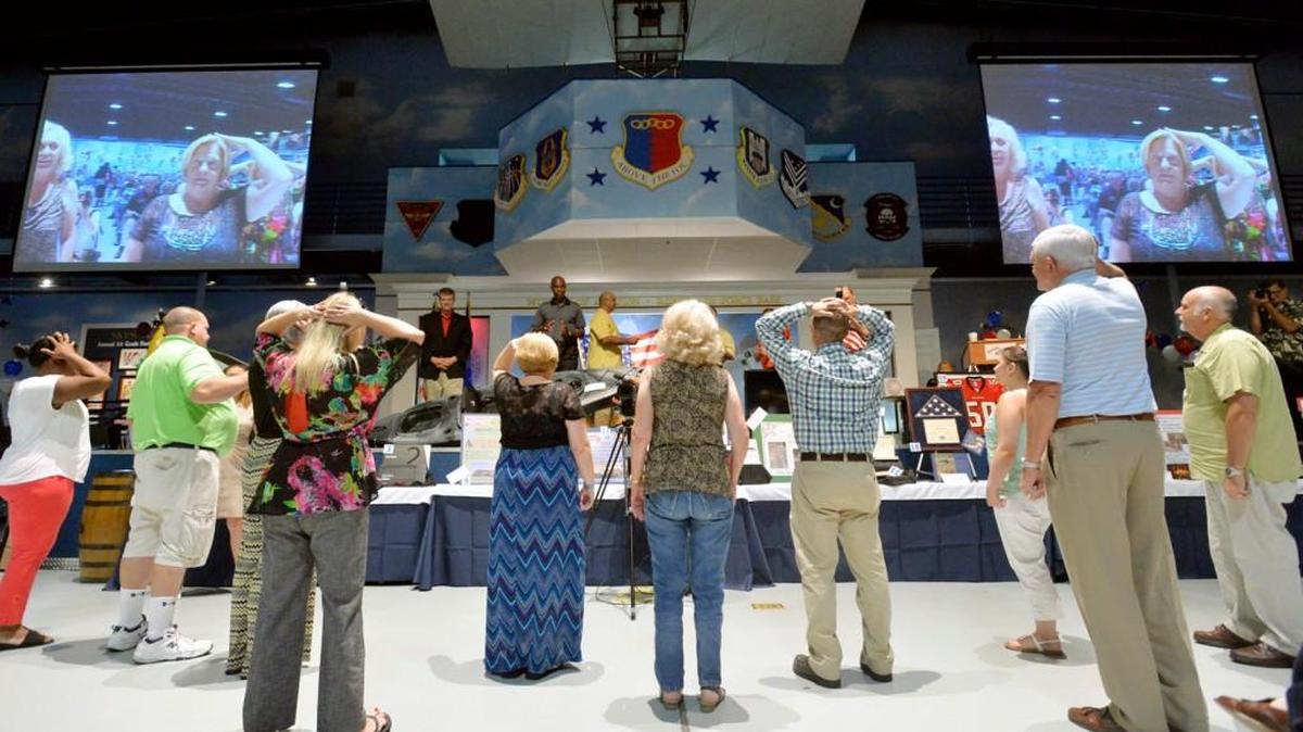 Guests participate in the 2014 Museum of Aviation Foundation Auction and Raffle and Taste of Local Cuisine.