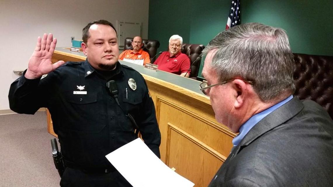 Charles “Chuck” Hadden is sworn in as Centerville’s new police chief by Mayor John Harley as City Council members Cameron Andrews and Randall Wright look on Feb. 21.
