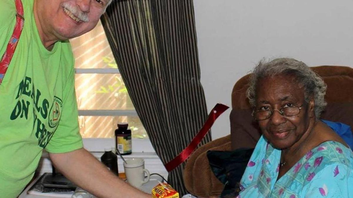Al Richardson, a volunteer with Houston County Meals on Wheels, delivers food to client Lula Fountain.