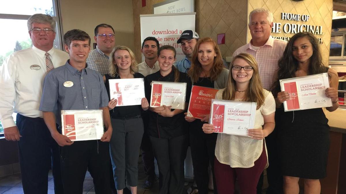 Posing for a photo at a ceremony marking the awarding of Chick-fil-A scholarship are, from rown from left, Christopher Allen,, Autumn Stolp, Rachel Boyd, Katie Tanner, Brianna Smisson, Amie Markel. Back row from left, are Pat Braski, owner-operator; Mike Lewis, general manager; Ezekiel Morales, Trent Williams and Danny Braski, director of operations.