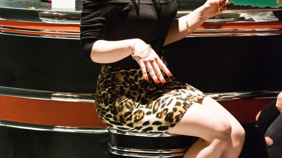 Annie Sinatra (Judy Marachino) sits with Kaylin Bailey (Little Debbie) before the play begins.