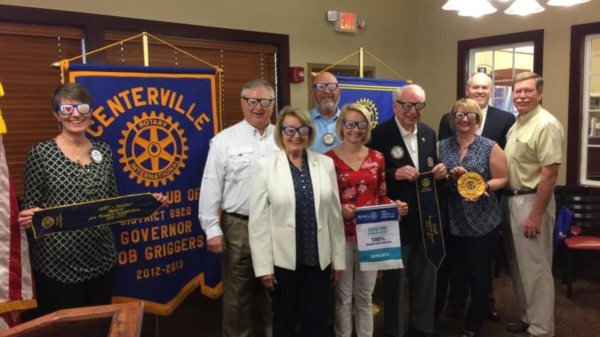 Members of the Rotary Club of Centerville show off their Rotary sunglasses and awards from the District 6920 meeting.