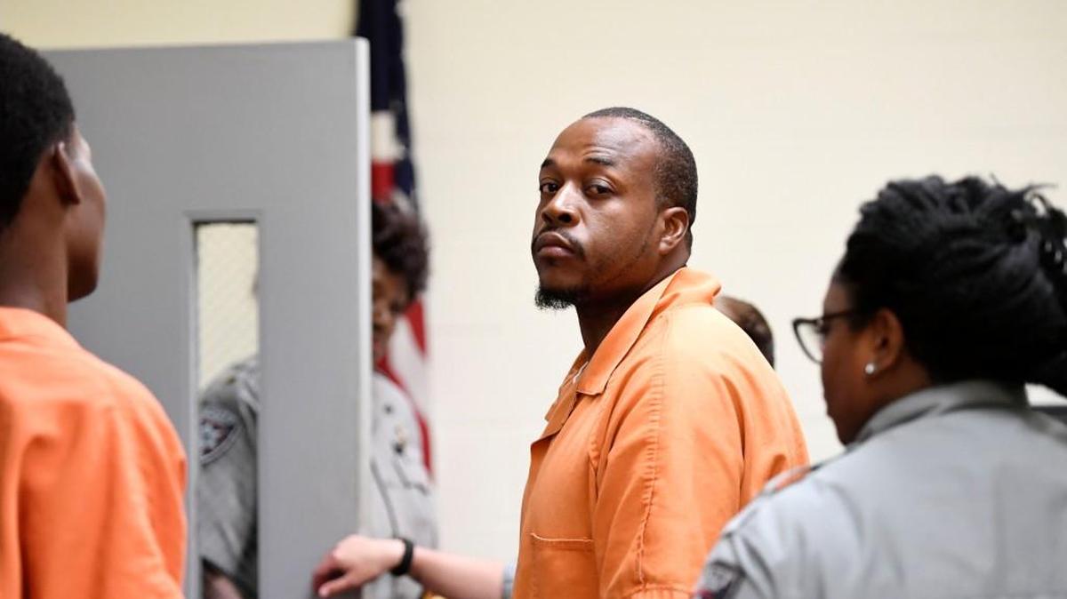 Calvin Stapleton leaving court in April after his arrest in the slaying of Andre Taylor.