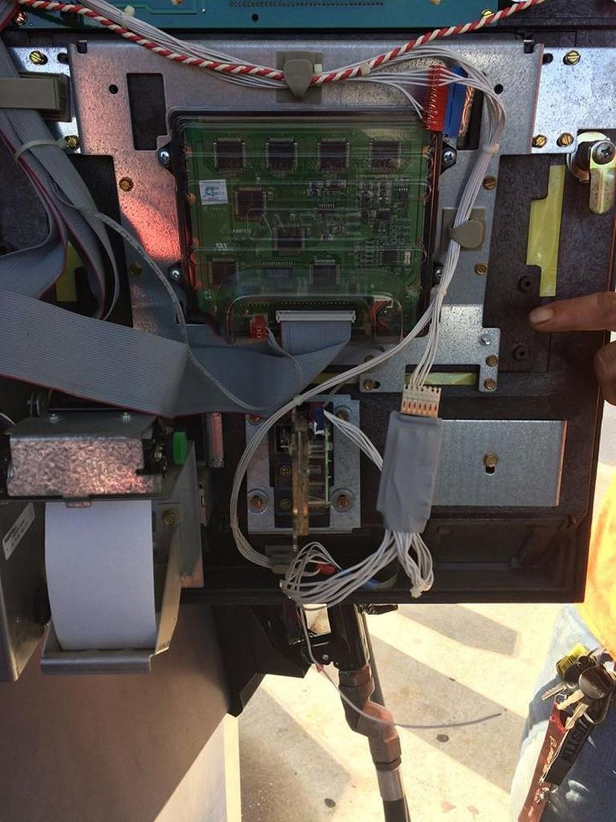The skimming device storage and transmitter.