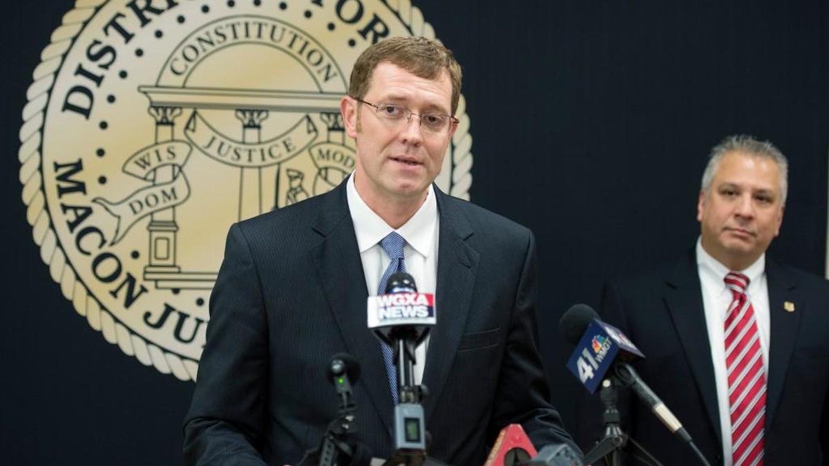 Macon Judicial Circuit District Attorney David Cooke speaks at a 2015 news conference.