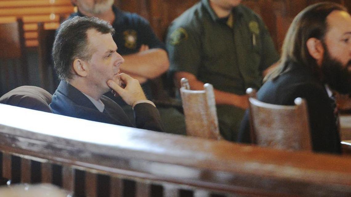 Christopher Keith Calmer left listens to arguments during a May 2016 hearing. The state is seeking a death penalty against Calmer on charges that he murdered Monroe County Sheriff's Deputy Michael Norris in 2014.