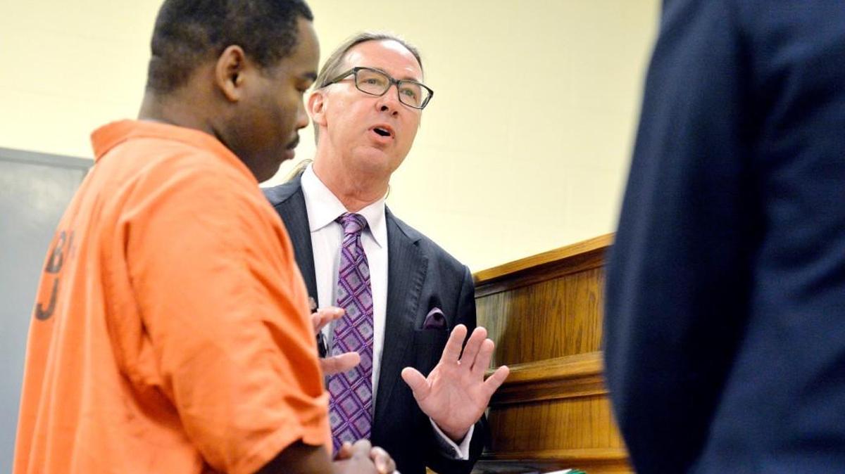 Attorney Franklin J. Hogue asks a question to investigator Shaun Bridger during a March commitment hearing for Damion Deray Henderson, who pleaded not guilty Wednesday in the death of Mercer basketball player Jibri Bryan.