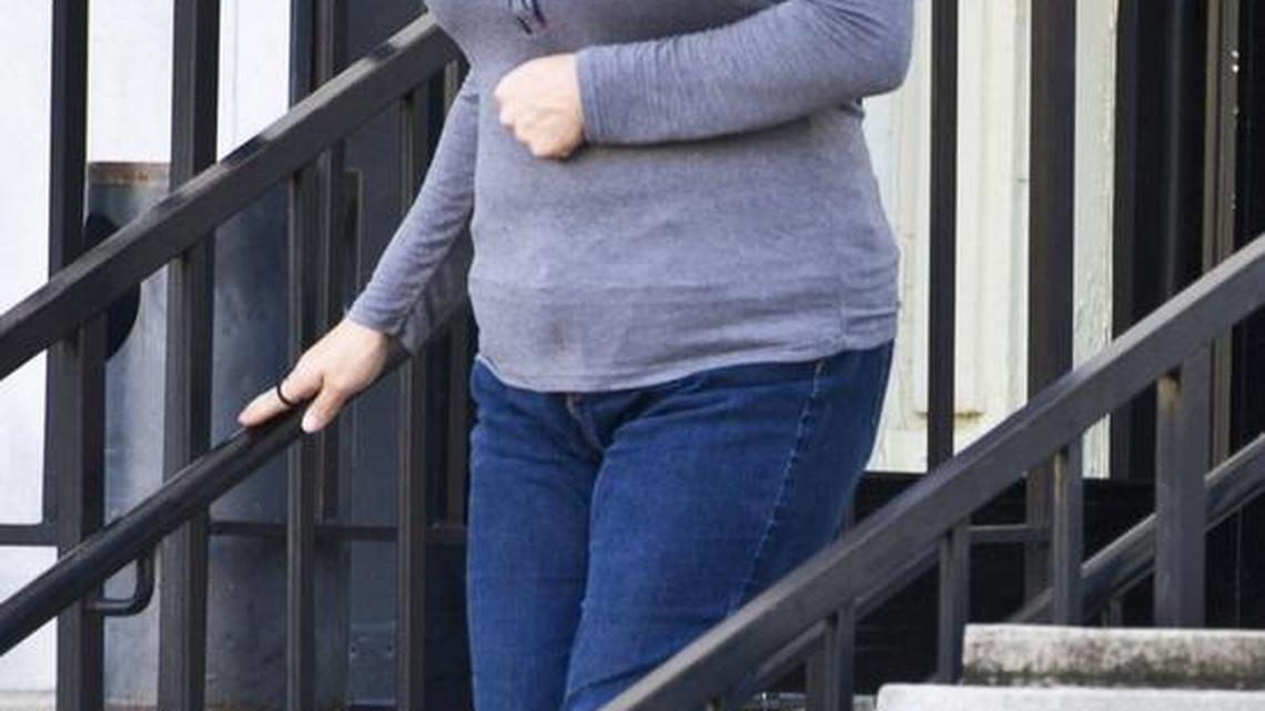 Holly Edwards, a Macon attorney who has pleaded guilty to drug offenses, leaves the federal courthouse after her sentencing hearing Wednesday morning.