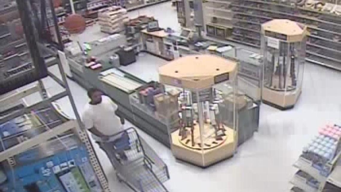 The suspect in three armed robberies Saturday is seen in an image from a Walmart surveillance video.