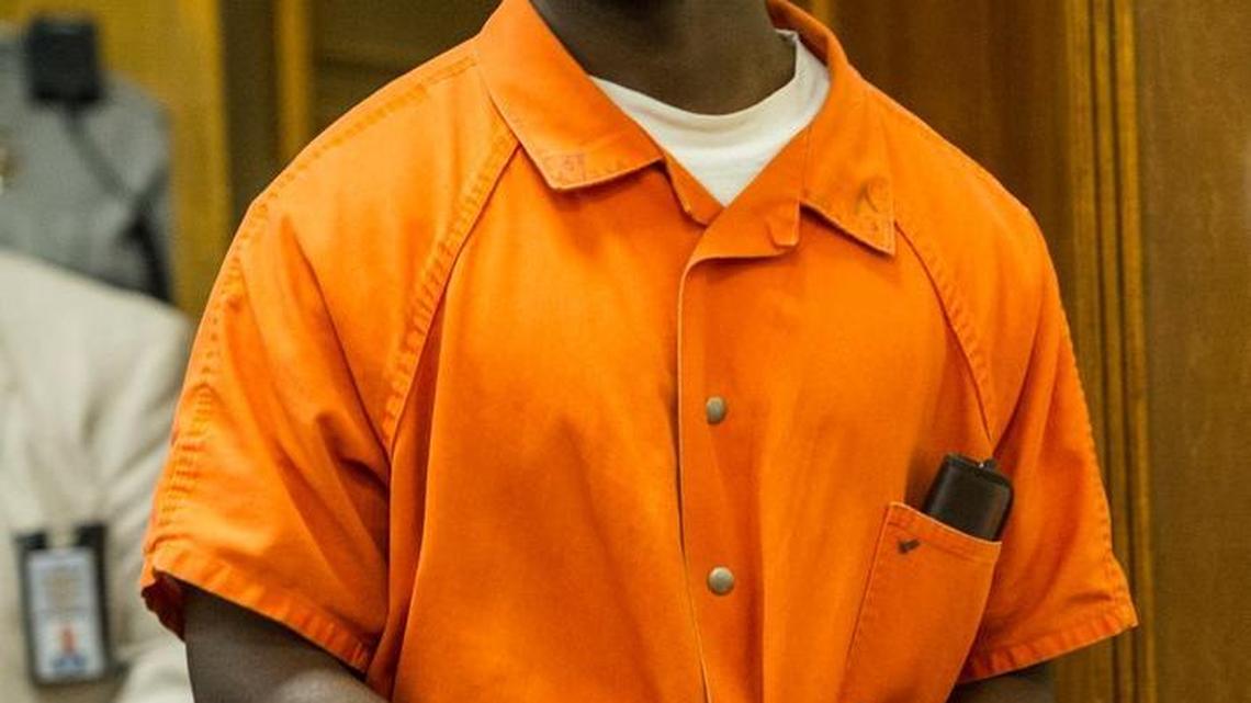 Roland Watson is shown in 2015 walking to the bench to plead guilty in the 2014 shooting death of Damian Bernard “Little Petey” Clayton at a Macon Little League ball park.