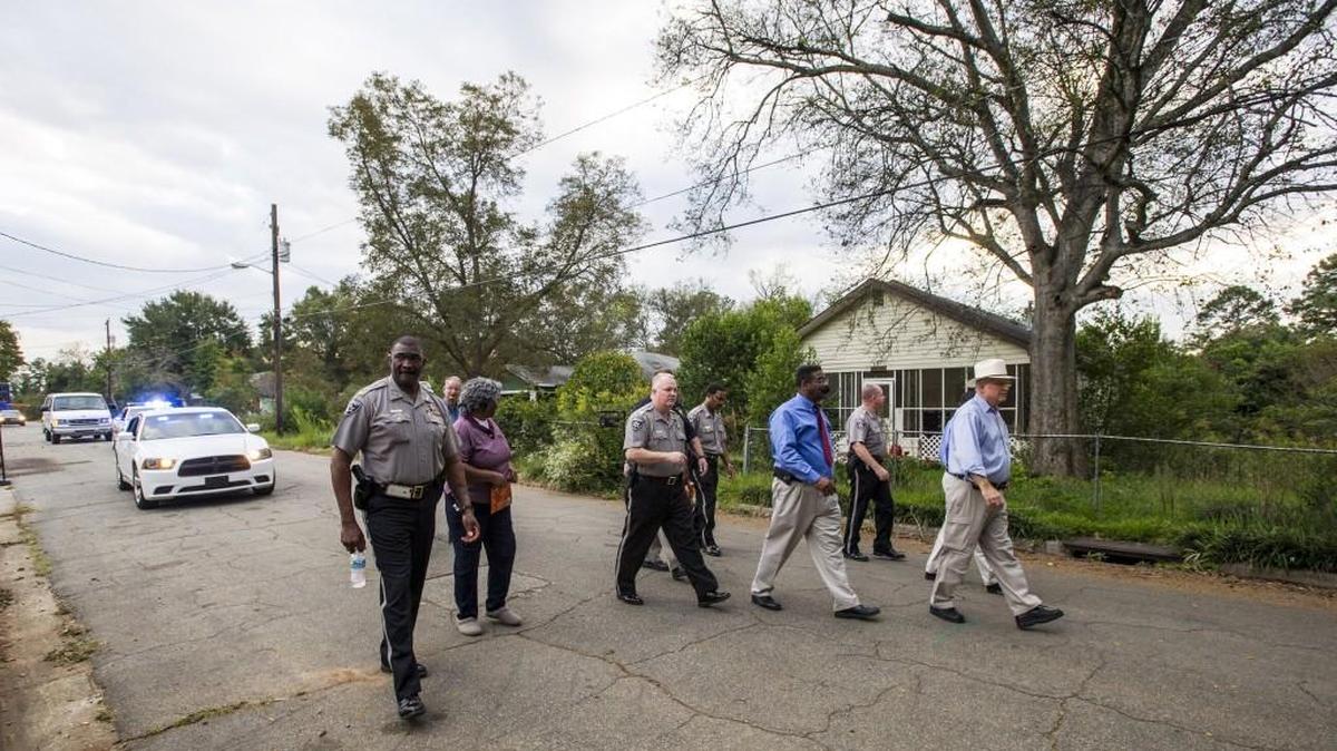 Sheriff David David walks around Lynmore Estates with deputies in October of 2015 as part of a continuing effort to improve community relations and fight crime. A Walk for Safety is planned Tuesday evening at Waters Edge off Lake Tobesofkee.