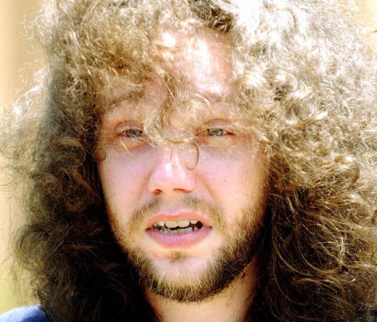 Stephen McDaniel pictured here along Georgia Avenue in the hours after his neighbor, Lauren Giddings, was found dead in a trash bin at their apartment complex in June 2011.