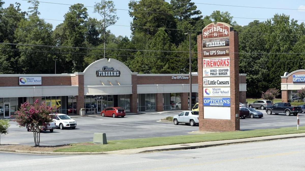 Bibb County Sheriff’s deputies found the badly decomposed body of a man behind the North Park II shopping center on Northside Drive on Saturday morning.