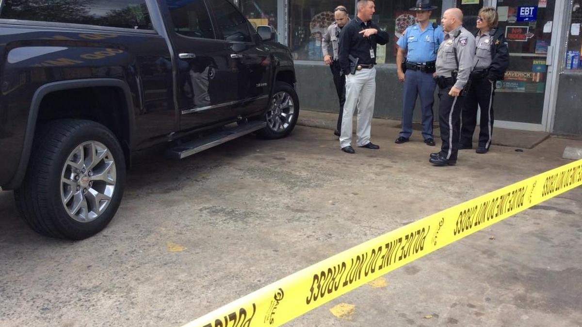 Bibb sheriff's deputies say a 2-inch bullet hole in the door of a 2015 Sierra was likely made by an AK-47 in a shootout Saturday afternoon near the Food Mart on Houston Avenue.