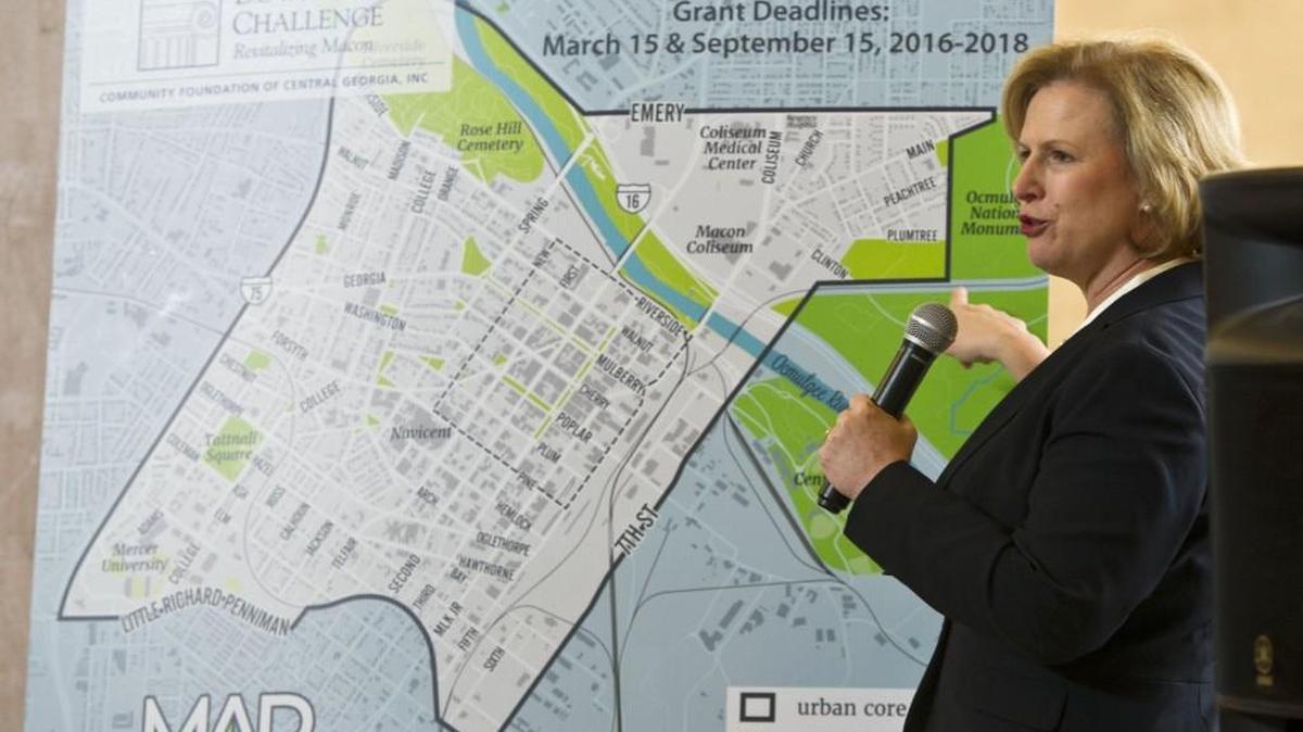 Kathryn Dennis, president of the Community Foundation of Central Georgia, announces the a $3 million Downtown Challenge grant at Terminal Station in January 2016.