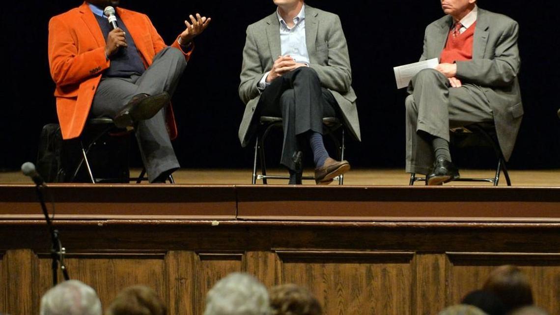 Imam Adam Fofana, left, Pastor Scott Dickison and Rabbi Larry Schlesinger talk about the differences and similarities between their faiths in front of packed Mercer University auditorium in January 2016.