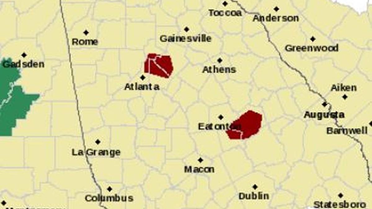 The National Weather Service issued a flash flood warning for parts of Baldwin and Hancock counties until 1:30 p.m. Wednesday.