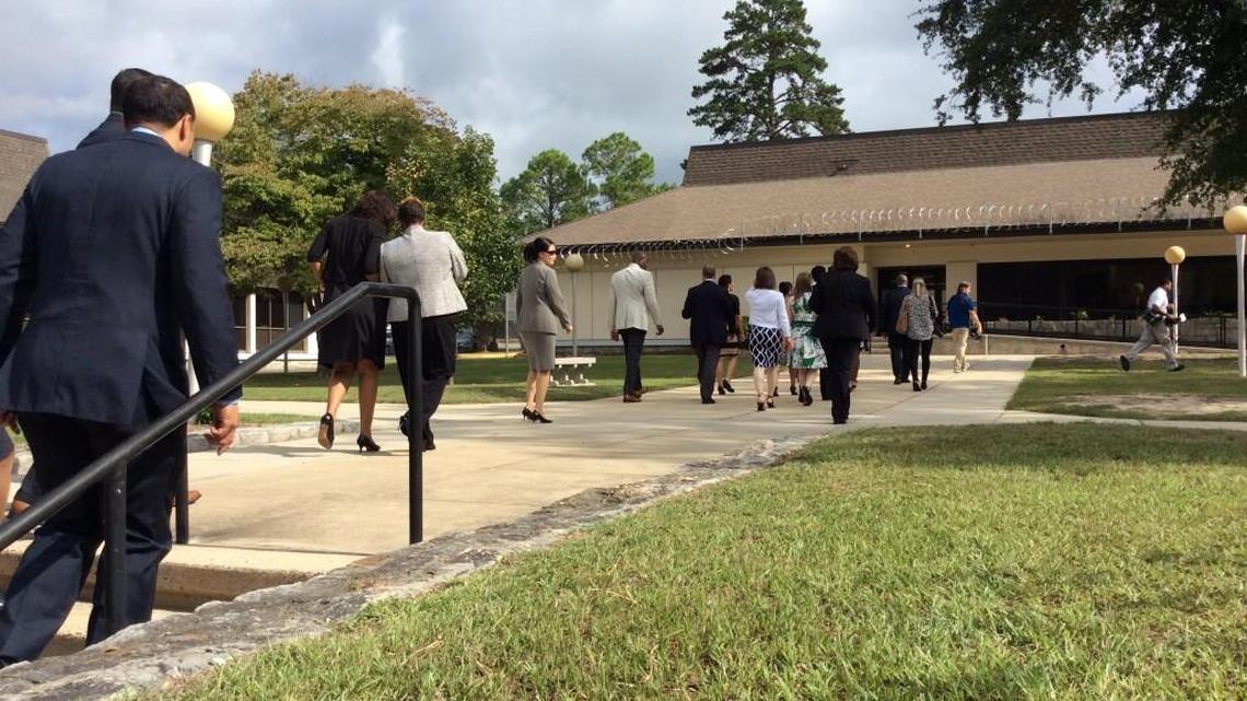 Guests take a tour of the Macon Youth Development Campus in August of 2015. The Department of Juvenile Justice is hiring dozens of corrections officers, teachers and nurses through job fairs across Georgia in November.