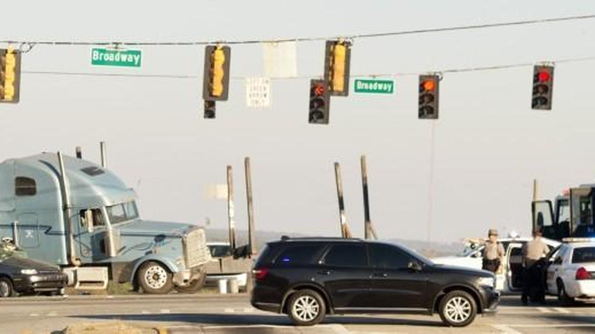 Emergency personnel investigate a Nov. 16, 2016, accident at the corner of Broadway and Eisenhower Parkway where authorities said a driver may have run a red light when the wreck occurred.