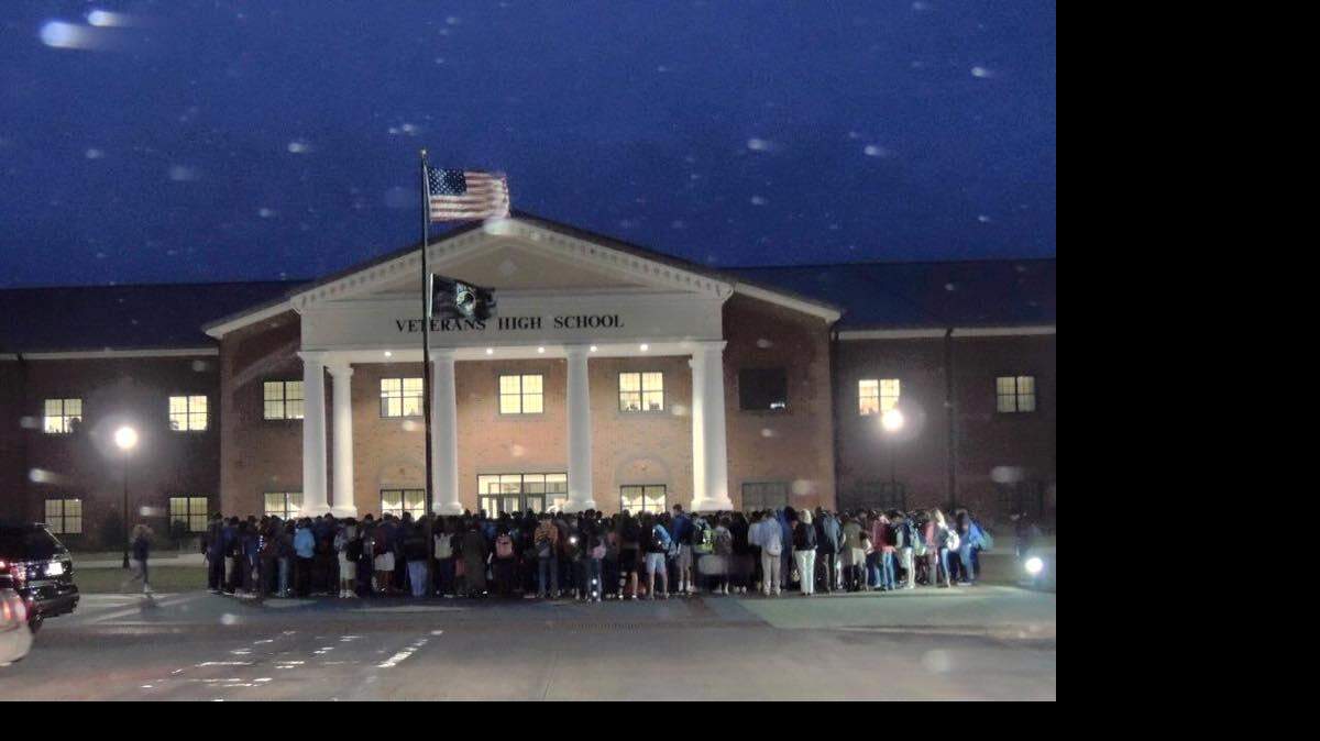 Members of the Veterans High School community gathered outside the school Oct. 27, 2015, to pray for student Ryan Skeen, who was shot Monday afternoon in Warner Robins.