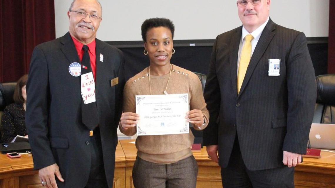 Terra McMillan, center, a science teacher at Thomson Middle School, traveled to Los Angeles over her spring break to accept the Vernier Technology Award during the National Science Teacher Association’s conference. She is pictured here with Houston County Board of Education Chairman Fred Wilson and Superintendent Mark Scott when she received the Georgia State Teacher of the Year award from the Air Force Association.