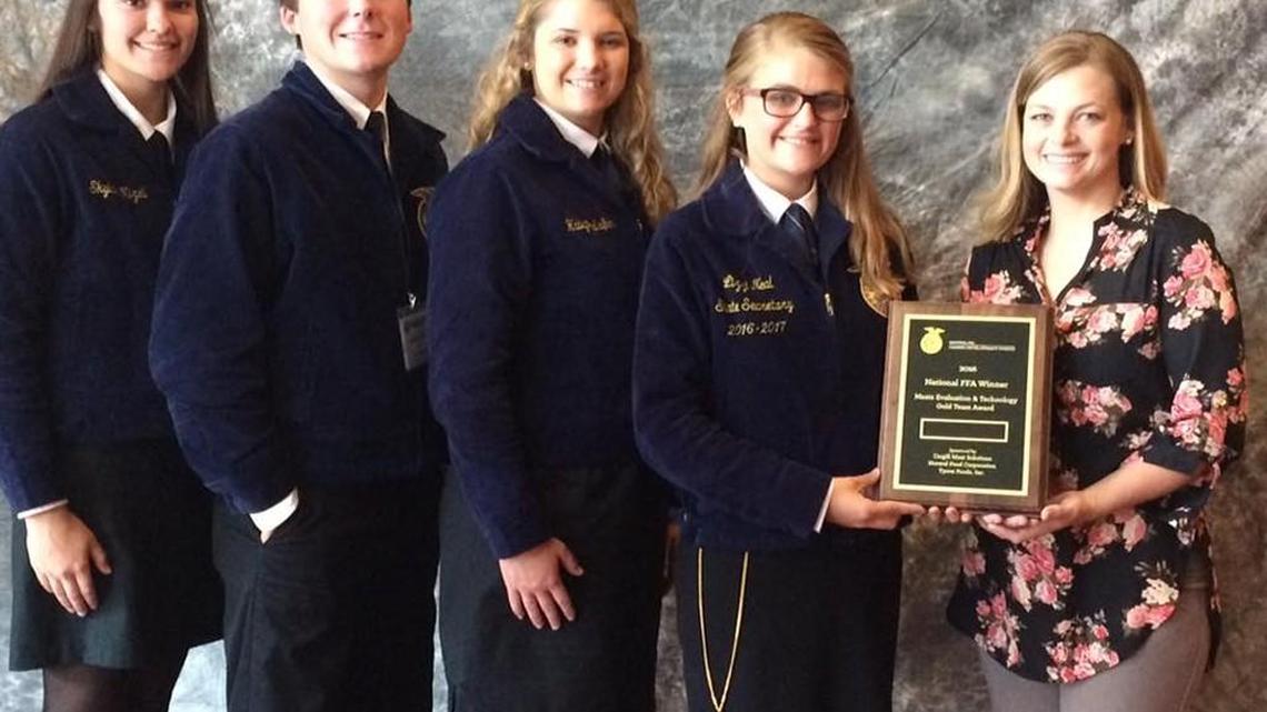 Perry High team members Skylar Mizell, Landon Tadich, Haley Pulsifer and Lizzi Neal are pictured with their FFA advisor Ashley Denton.